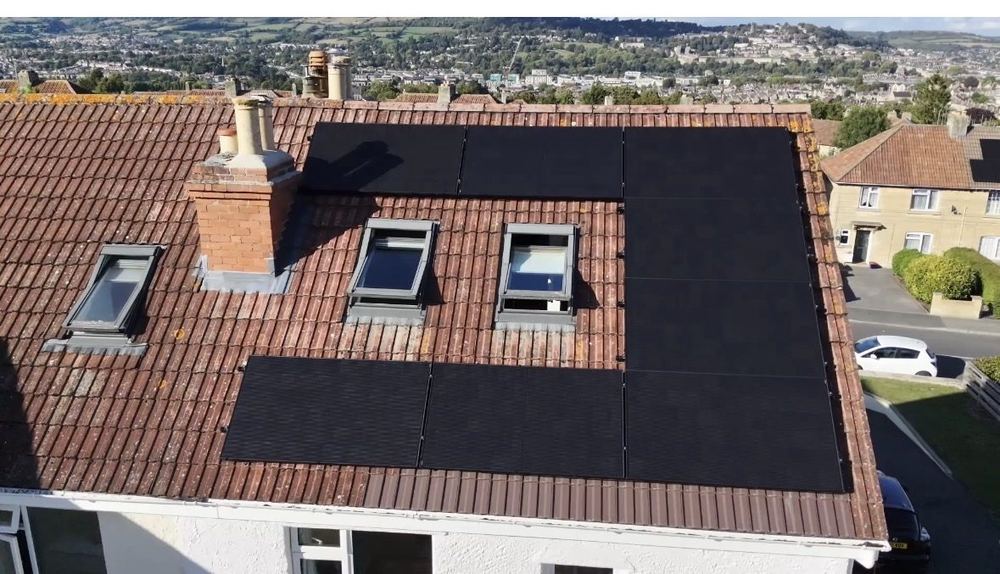All-black 4.08kW solar array fitted around three roof windows on a tiled roof in Bath